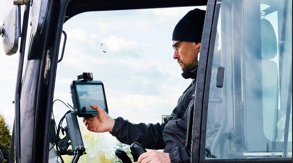 CHCNAV machine control system on an excavator at a construction site