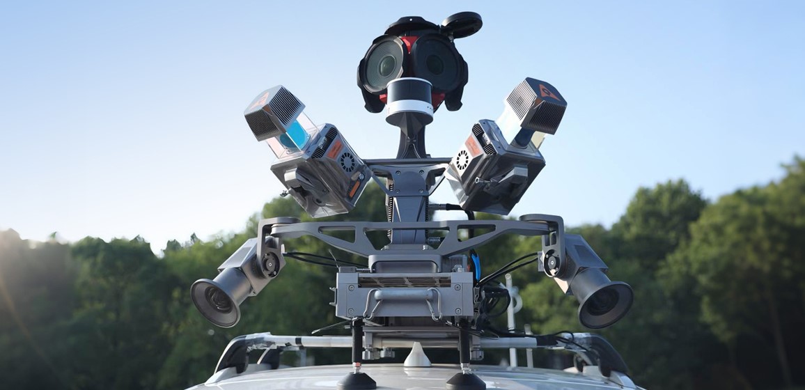 Vehicle-mounted 3D mobile mapping system for surveying and asset management