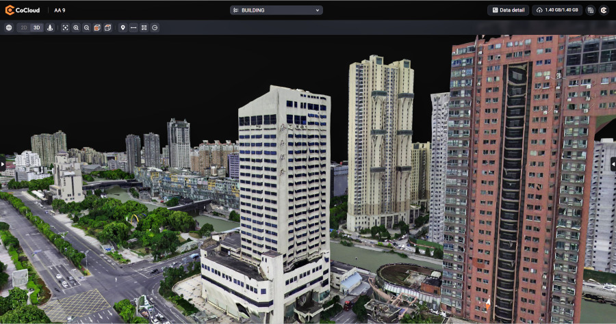 A 3D urban reconstruction displayed in CoCloud platform, showing high-rise buildings, roads, and green areas in a dense city environment.